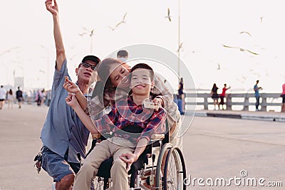 Diverse families with disable child Stock Photo